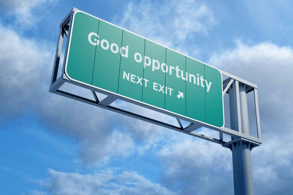 freeway sign that says good opportunity next exit